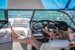 woman driving boat